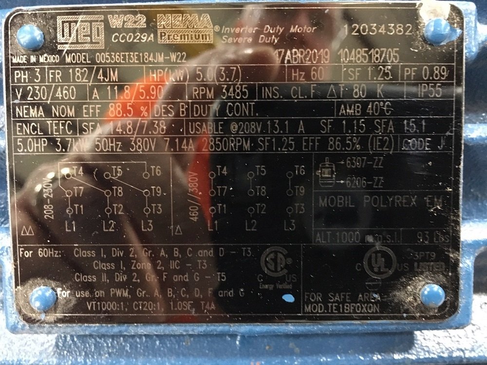 WEG severe-duty motor nameplate, a glare-shot photo